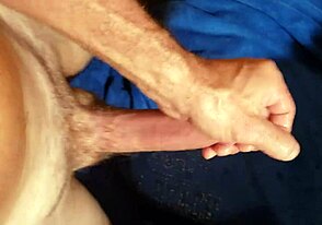 Soloboy grips his massive cock and tugs till he explodes