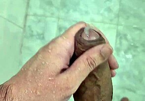 Young twink shows off in steamy bathroom solo.