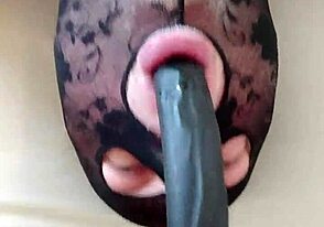 Oral Fun with Long Dildo in Bedroom Close-Up