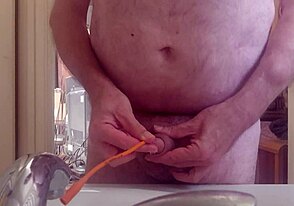 Horny as hell, needing to piss, I used a catheter to stroke inside my uncut cock. Wild bathroom solo!